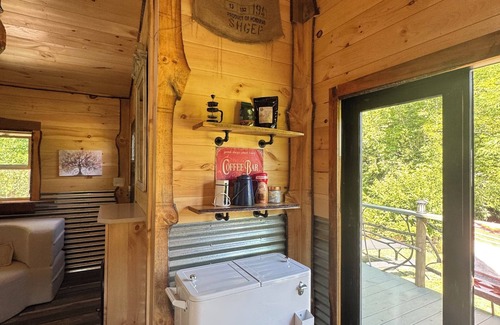 Hillsville Cabin | Tiny cabin sits by the bubbling, stocked creek. Pet friendly