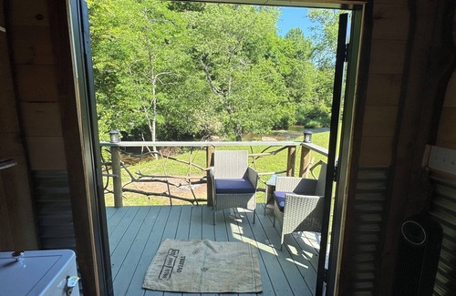 Hillsville Cabin | Tiny cabin sits by the bubbling, stocked creek. Pet friendly