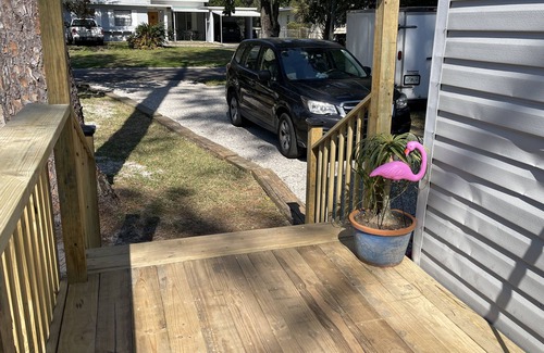 Jacksonville Apartment | Tiny home for 2 with Flamingo theme EV Chging L1&2