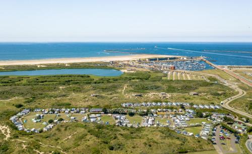 IJmuiden Ski Chalet | Tiny House in de duinen van IJmuiden aan Zee