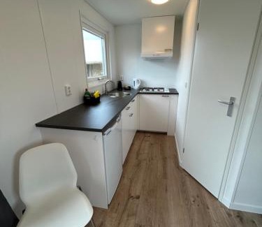 IJmuiden Ski Chalet | Tiny House in de duinen van IJmuiden aan Zee
