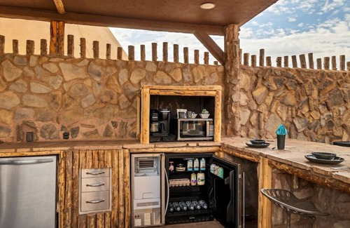 Virgin RV Rental | Tipi Perfect for Stargazing In Zion Chief Tipi #41 on the Pond w/ 1 King Bed, Hot Tub & Outdoor Kitchen