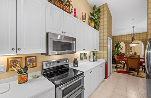 Naples Condo | TIRED OF COLD WEATHER?nSpacious, luxurious Condo with lake/golf course views.n
