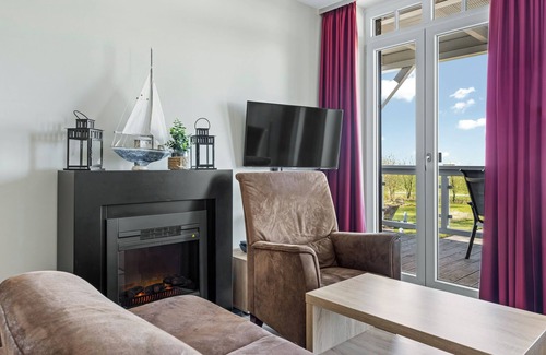 Wremen Apartment | Tolle Ferienwohnung in Strandnähe mit Sauna, Strandkorb u. Balkon mit Meerblick
