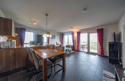 Schillig Apartment | Tolles Ferienapartment an der Nordsee mit Meerblick, Balkon, Sauna und Hot-tub