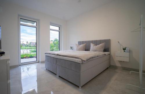 Rhauderfehn Apartment | Tomkes Ferienwohnung am See