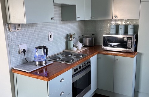 Sea Point Apartment | Top Corner Apartment With Views To Robben Island and a corner of Table Mountain