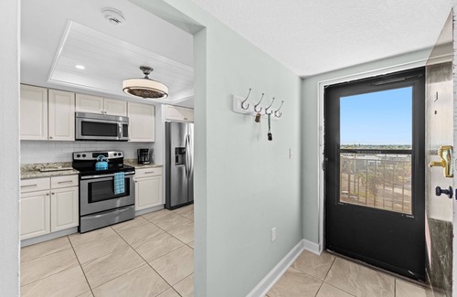 Satellite Beach Condo | TOP END UNIT, OCEANFRONT, 2024 RENOVATED, BARN DOOR Master shower, GORGEOUS