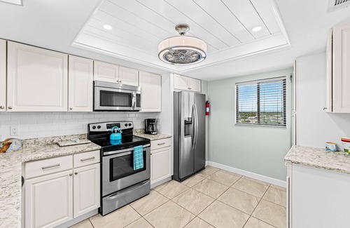 Satellite Beach Condo | TOP END UNIT, OCEANFRONT, 2024 RENOVATED, BARN DOOR Master shower, GORGEOUS
