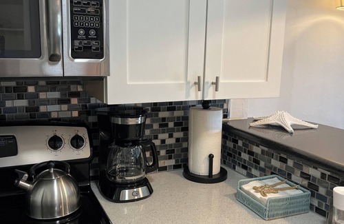 Pacific Beach Condo | Top floor beach getaway! Overlooks the pool and has all the amenities.