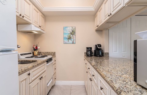 Marco Island Condo | Top Floor Condo, Steps Away From J.W. Marriott and Beach Access!