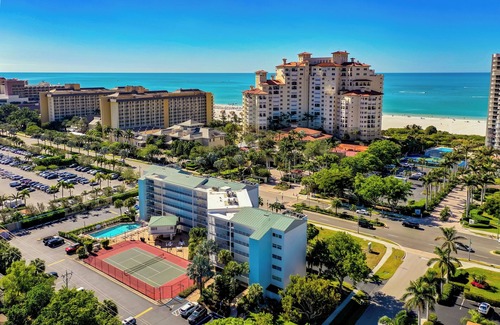 Marco Island Condo | Top Floor Condo, Steps Away From J.W. Marriott and Beach Access!