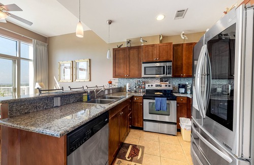 Galveston Condo | Top-floor non-penthouse condo with great ocean views, hot tub, heated pool
