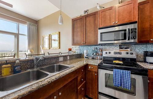 Galveston Condo | Top-floor non-penthouse condo with great ocean views, hot tub, heated pool