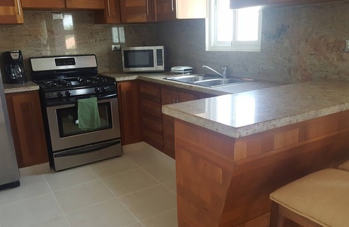 La Esplanada Apartment | Top-floor quiet condo with large pool and garden near everything, BBQ/WiFI/TV