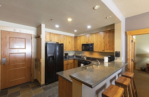 Whitefish Condo | Top floor ski condo with direct ski in and out. Hiking and biking too! Hot tub