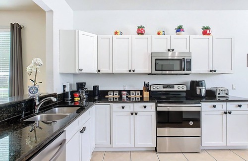Windsor Hills House | TOP-RATED Windsor Hills Home ♥ THEATER ROOM, Game Room, Pool/Spa ♥4 Mi to Disney