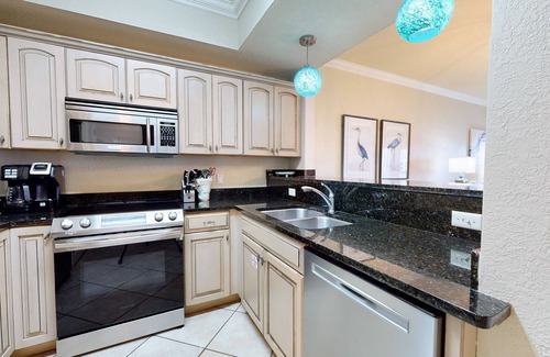 Four Mile Village Condo | Tops'l Summit 913 Great pool, hot tub, close to beach, private resort