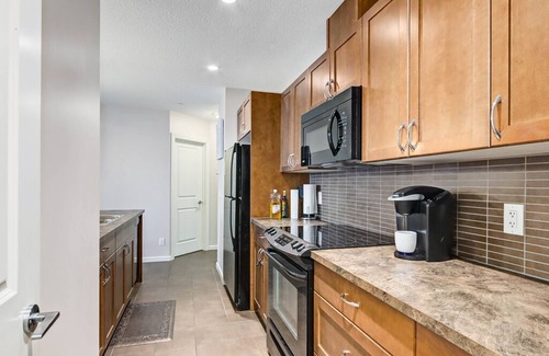 Victoria Park Condo | *TOWER VIEW HIGH-RISE* BMO/Stampede/Saddledome