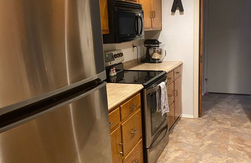 Park Forest Village House | Townhome 3 miles from Stadium - free garage parking