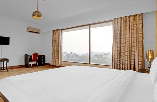 Aarey Colony Hotel | Townhouse 799 Royal Palms Hotel - Lily Collection