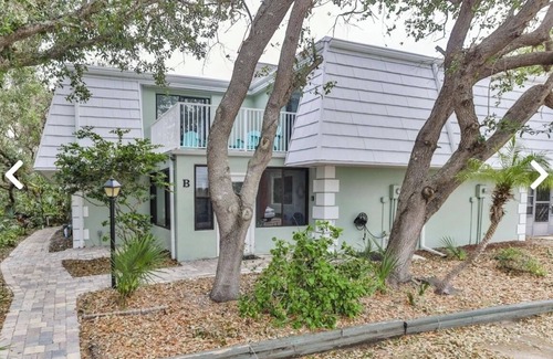 New Smyrna Beach House | Townhouse Sleeps 6 across street from Beach! Swimming Pool & Clubhouse!