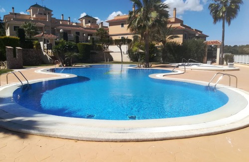 Calas de Mallorca House | Townhouse with communal pool and jacuzzi, located a few meters from the beach.