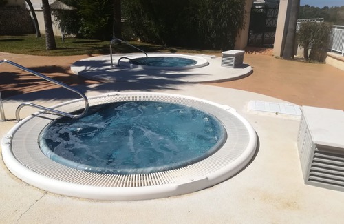 Calas de Mallorca House | Townhouse with communal pool and jacuzzi, located a few meters from the beach.