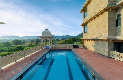 Udaipur District Resort | Traavista Aravali Mahal - Luxury Lake View Heritage Resort in Udaipur