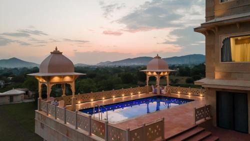 Udaipur District Resort | Traavista Aravali Mahal - Luxury Lake View Heritage Resort in Udaipur
