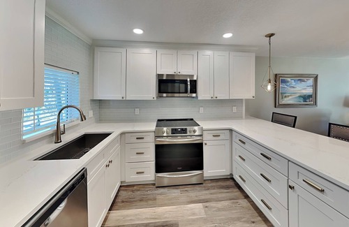 Crescent Beach Condo | Tradewinds 101 | Beachfront Condo with Patio, Pool View and Beach Access