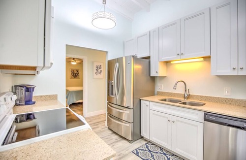 Key Colony Beach House | Tradewinds - Beautiful, Private Backyard, XL Porch. Canal, Pool Club, 2 Kayaks.