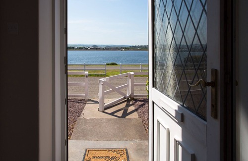 Inverness Cottage | Traditional stone built cottage, beautifully renovated,uninterrupted Sea view