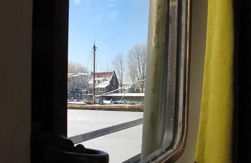 Haarlemmerbuurt Boat Rental | Traditional Stylish Houseboat, Own Entrance, With Bikes.