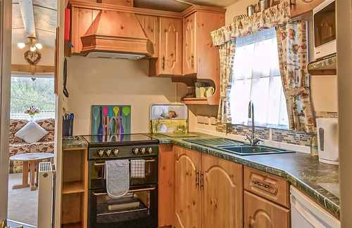 Dolgellau House | Traditional yet comfortable caravan with one double and one twin.