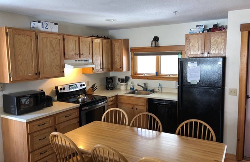 Carrabassett Valley Condo | Trailside, four bedroom, sun filled condo, with pool, view of Sugarloaf and AC