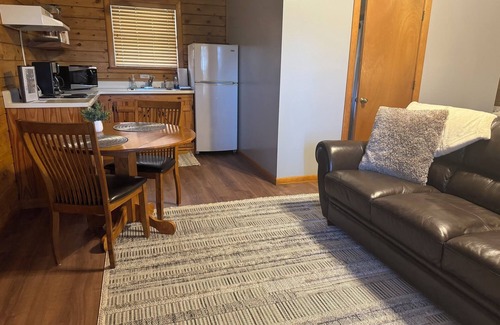 Eureka Springs Cabin | Tranquil Cabin- Perched on Mountain Top boasting jacuzzi for two and expansive deck with views! Trail & Cave on Property!