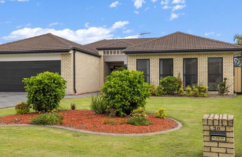 Banksia Beach House | Tranquil Canal Front Holiday House
