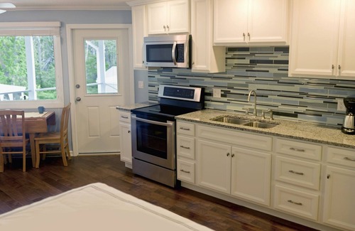 East Boothbay Condo | Tranquil! Oceanfront Sunsets with beach at low tide and dock