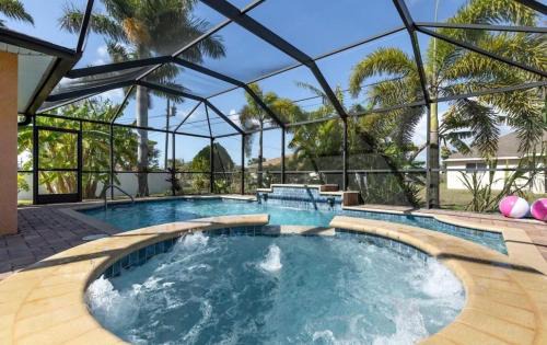 Diplomat House | Tranquil Palms Heated Pool Spa Outdoor TV & More