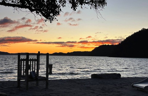 Rototai House | Tranquil Retreat with Breathtaking Lake Views: Renowed for Trout Fishing