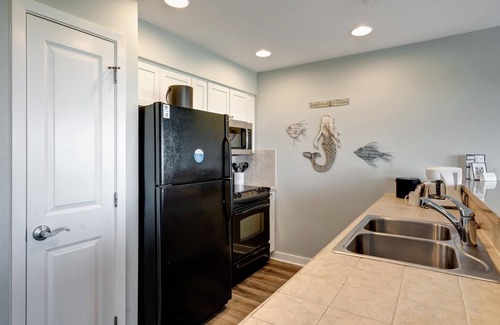 Four Mile Village Condo | Tranquil Sandestin 1BR Sanctuary: Scenic Balcony, Sun Deck, Spa Access & Resort Perks Await!