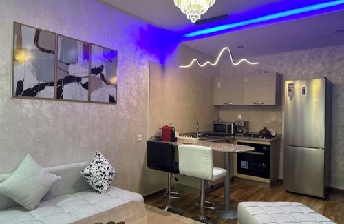 Cite Al Mohammadi Apartment | Tranquil Stay: Pool, Garden & Hassle-Free Check-In