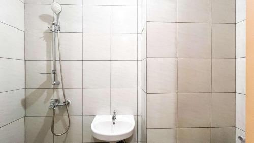 Makassar Apartment | Tranquil Studio (No Kitchen) Apartment Bandaraya - Tallasa City Makassar By Travelio