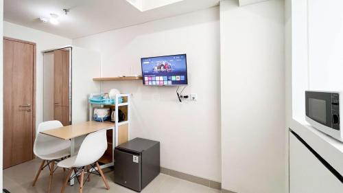 Makassar Apartment | Tranquil Studio (No Kitchen) Apartment Bandaraya - Tallasa City Makassar By Travelio