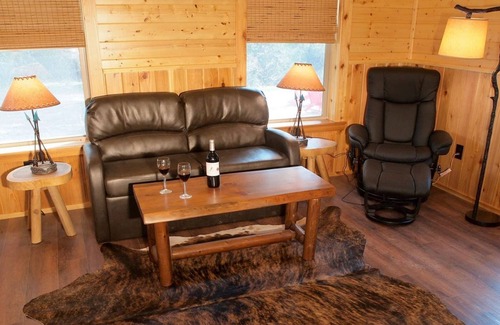 Cat Spring Cabin | Tranquility Cabin Surrounded By Live Oak Trees With A Fabulous Hot Tub!
