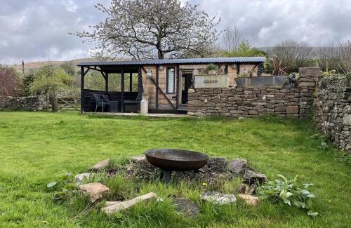 Cwmdu House | Transformed Railway Wagon- Sleeps2-Garden-Firepit