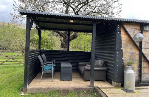 Cwmdu House | Transformed Railway Wagon- Sleeps2-Garden-Firepit