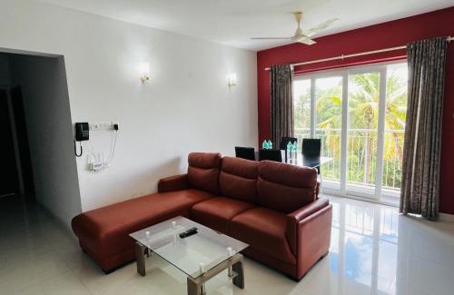 Nedumbassery Apartment | Transit suites by Habitat