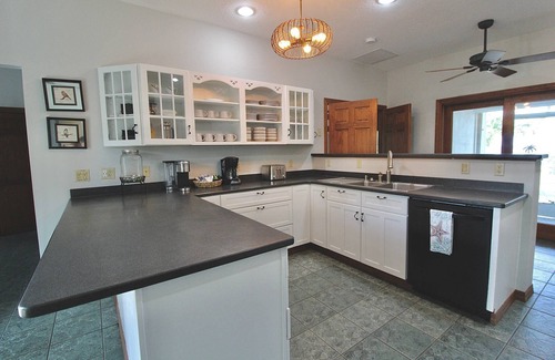 Indian River Estates House | Treasure Cove! Private Waterfront Tudor Style 4BR Home On The Indian River